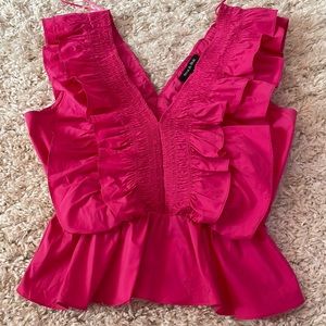 This strut and bolt top is so cute and perfect to pair with jeans.